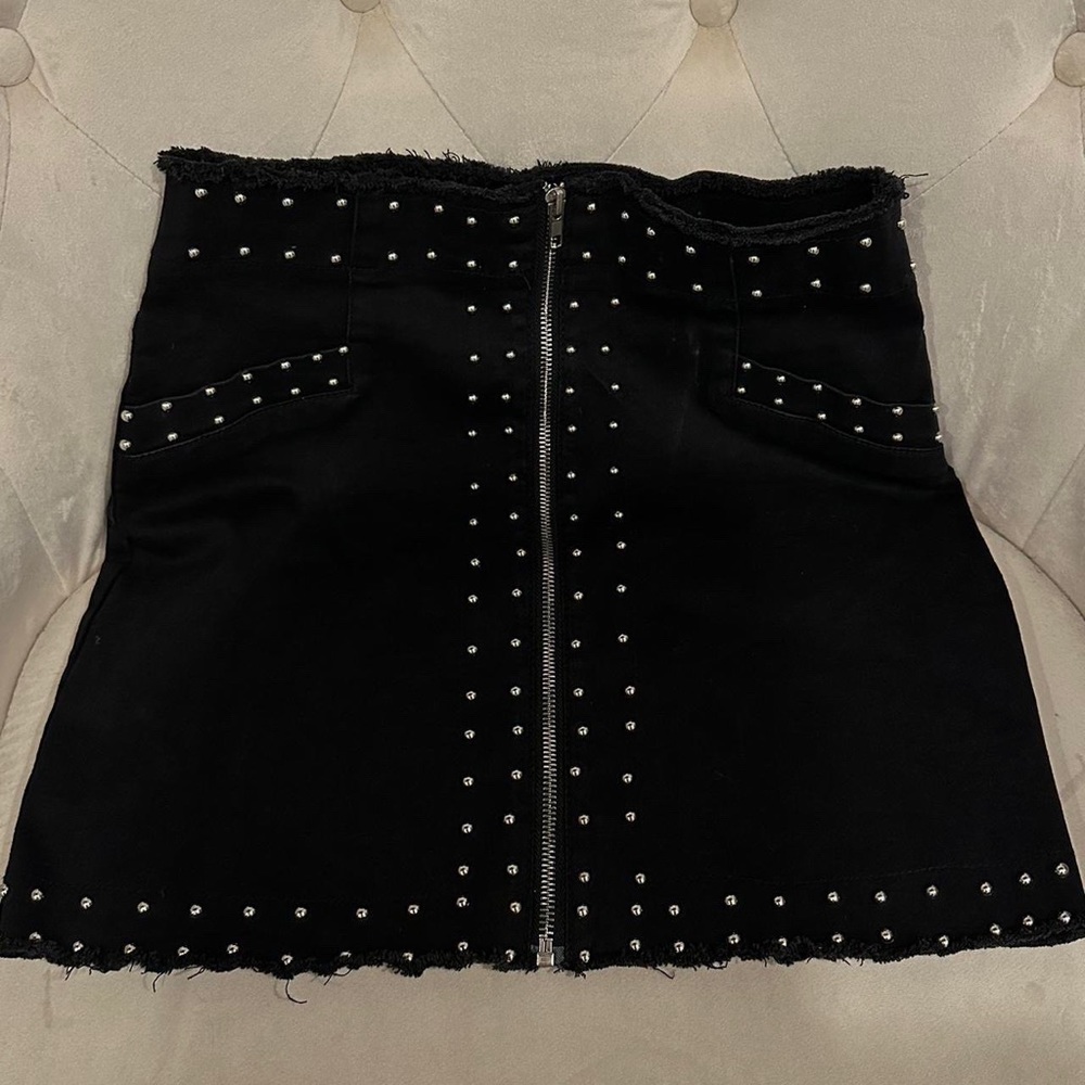 studded black mini skirt